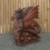 Product image 1 of the product “Dragon with leg lifted on the left made from suar wood, about 50cm Height ”